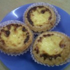 Kuching Breakfast: Egg Tarts Coconut Spring Rolls Chinese Rice cake and Popiah